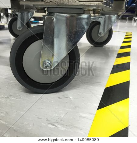 Trolley wheels made of antistatic resin for use in the factory.