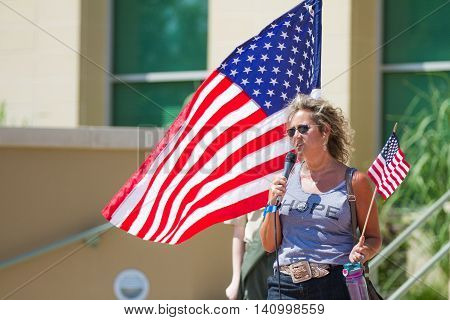 MERIDIAN IDAHO/USA - JULY 30 2016: Woman tells her story in support of teh local police at the pro police rally in Meridian Idaho