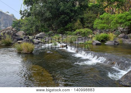 Da Nhim river near pongour vietnam in dry season with rock on the bottom of the stream