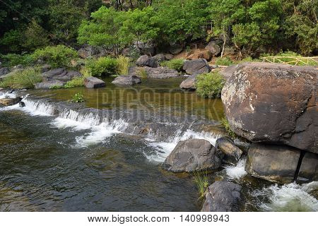 Da Nhim river near pongour vietnam in dry season with rock on the bottom of the stream