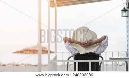 Summer Vacation Lifestyle With Young Girl Wearing Sunscreen Hat On Sunny Day Relaxing Taking It Easy