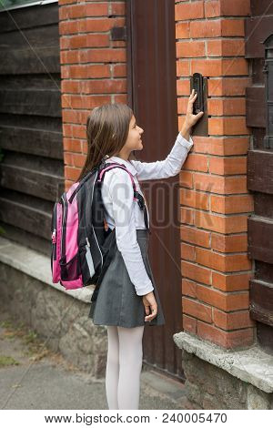 Teenage Girl Ringing In House Doorbell After Going To School