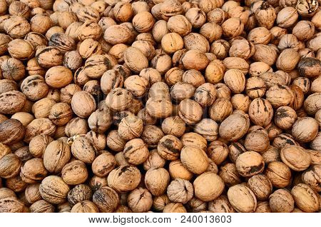 A Lot Of Walnuts (juglans Regia) Or German Name Is Walnüsse In The Market.