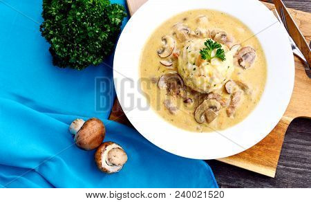 Sour Mushroom Sauce With Bread Dumpling (german Name Is Saure Schwammerlso