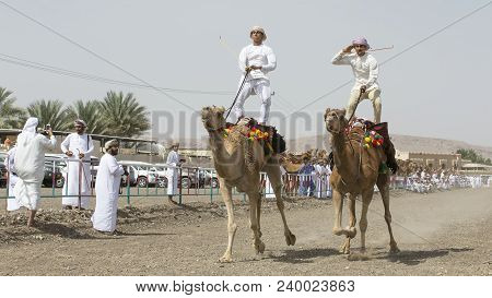 Ibri, Oman, 28th April 2018: Omani Men At A Traditional Horse Race Event Where Young Riders Show The