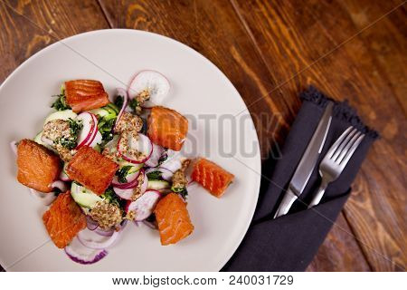 Red Fish Salmon With Radish And Spinach, Served On White Plate On Wooden Table. Rustick Style. View 