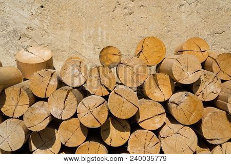 Pile Of Worked Wooden Roundish Clear Beautiful Logs, Stacked Firewood