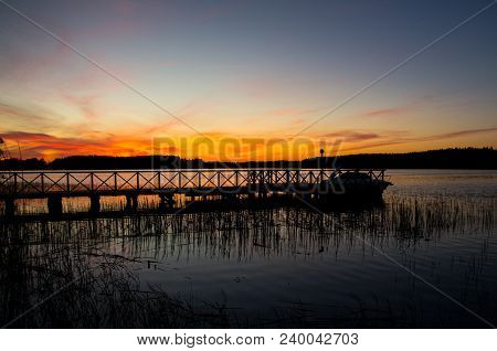Save
Download Preview
Summer Travel Vacation And Holiday Concept - Wooden Pier Between Sunset In Pol