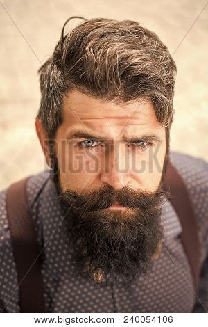 Portrait View Of One Handsome Senior Stylish Man With Black Hair And Long Lush Beard In Blue Shirt S