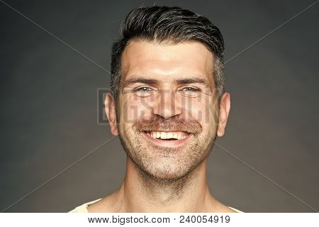 Portrait Closeup Of One Handsome Sensual Shaved Man With  Bristle Smiling Andl Looking Forward In St
