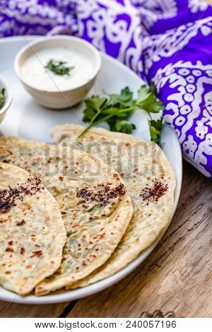Azerbaijani Traditional Cuisine. Horizontal Shot Of Qutabs -flatbread With Greens. Served With Yogur