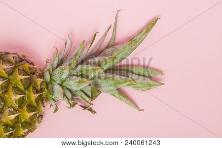 Half Cut Juicy Pineapple On A Pastel Pink Background. Minimal Summer Concept.