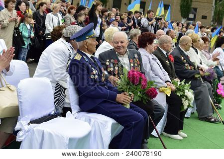 Ukraine, Kiev - 05.9.2016: People Celebrate The Day Of Victory In The Streets Of The City, A Militar
