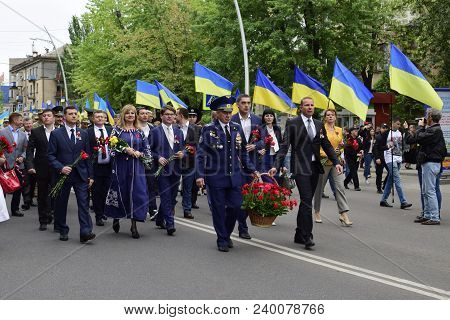 Ukraine, Kiev - 05.9.2016: People Celebrate The Day Of Victory In The Streets Of The City, A Militar