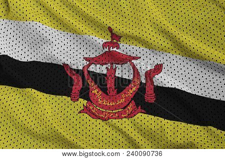 Brunei Darussalam Flag Printed On A Polyester Nylon Sportswear Mesh Fabric With Some Folds