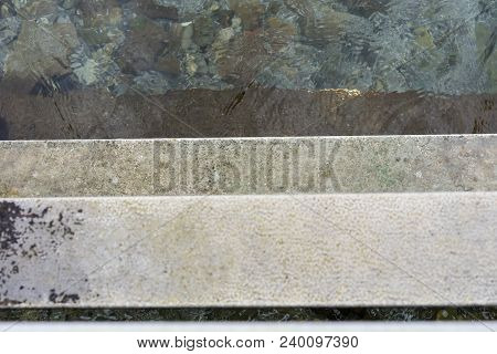 Descend Grey Concrete Stairs Into The Water, Concept Photography