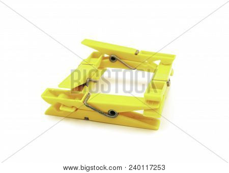 Four Yellow Pegs On White Background - Square