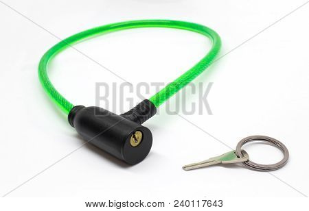 Green Bicycle Cable Lock With Key Isolated On White Background