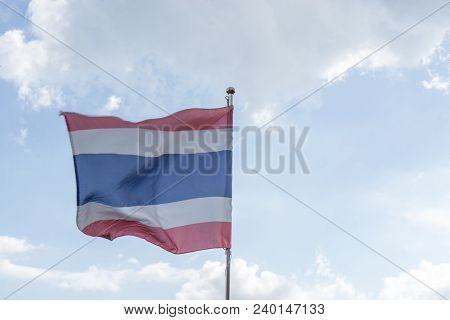 Picture Of Waving Thai Flag Of Thailand With Blue Sky Background., King Bhumipol