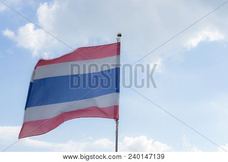 Picture Of Waving Thai Flag Of Thailand With Blue Sky Background., King Bhumipol