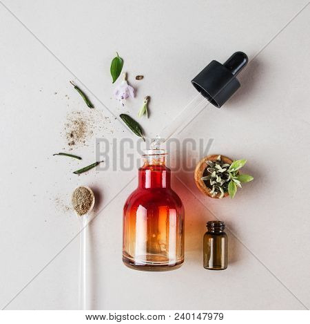 The Minimal Style. Natural Cosmetics, Handmade Skin And Body Care. Orange Bottle With Piped And Vege