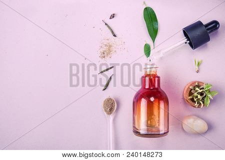 The Minimal Style. Natural Cosmetics, Handmade Skin And Body Care. Orange Bottle With Piped And Vege