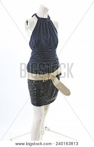 Black Mini Dress On Headless Mannequin Cloth Display Dressmaker Doll Figurine. Fashion Designer Clot