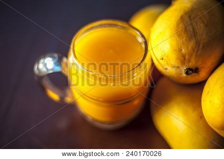 Popular Indian Asian Sweet Dessert Dish Eaten At The Time Of Lunch ‘aam Ras’ Juice Of Kesar Kair Wit