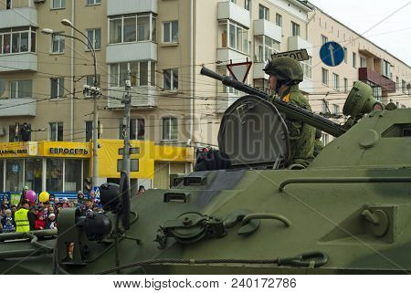 Perm, Russia - May 09, 2018: Btr-82 Armored Personnel Carrier With A Crew On A City Street After The