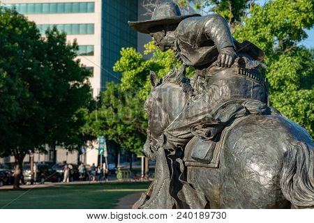 Dallas, Texas - May 7, 2018: View Of Cowboy And Longhorn Cows With Cattle In The Background, As Part
