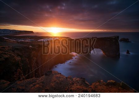Beautiful Sunrise Over Dyrholaey Cliffs And Rocky Arch, Iceland