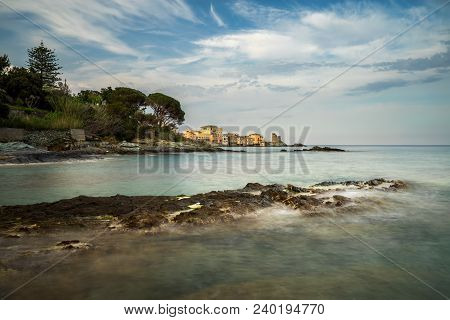 Erbalunga Village And Harbour With Rocks On Foreground, Corsica, France