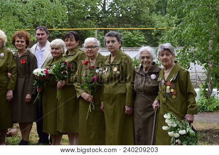 Ukraine, Kiev - 05.9.2016: People Celebrate The Day Of Victory In The Streets Of The City, A Militar