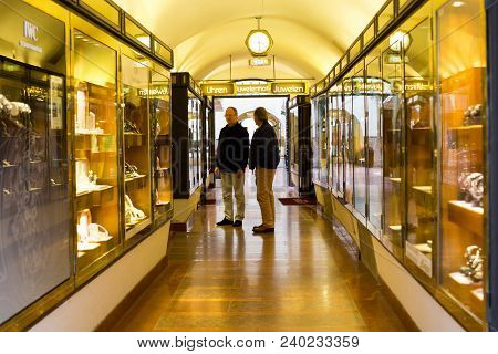 Salzburg, Austria - Circa Oct 2017: People Shopping In Center Of Salzburg. Male Persons At Watch Sho