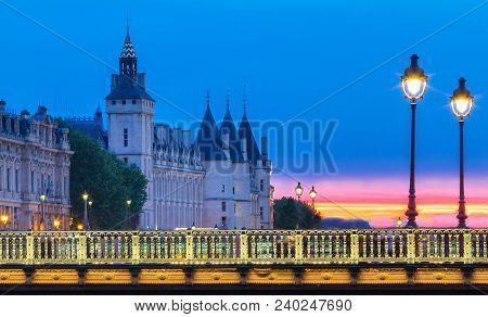 The Sunset In Paris, Arcole Bridge And Conciergerie, Paris. France