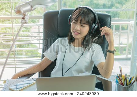 Student Learning Online Study Concept: Beautiful Asian Girl Sitting Smile Seem So Happy To Listening