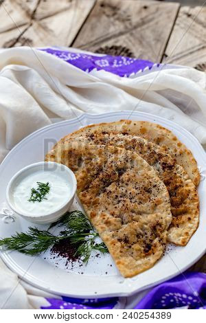 Azerbaijani Traditional Cuisine. Horizontal Shot Of Qutabs -flatbread With Greens. Served With Yogur