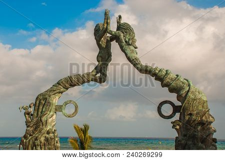 Entrance Of The Beach In Playa Del Carmen, Mexico. Riviera Maya. Sculpture Of A Man And Woman's Join