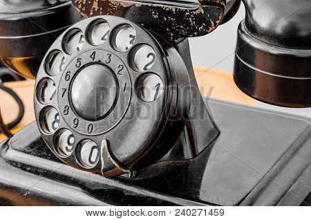 Disk Dialer Of Old Vintage Black Phone Close-up