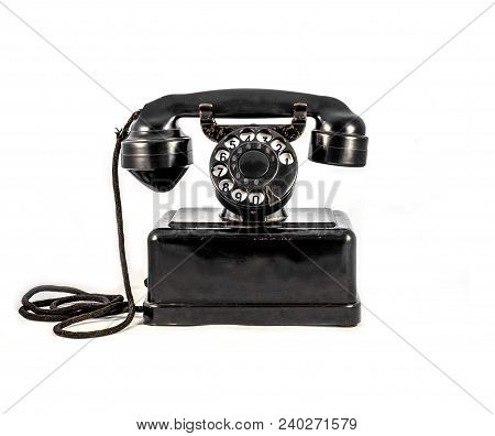 Old Vintage Black Phone On White Background