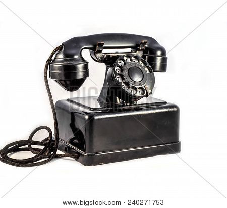 Old Vintage Black Phone On White Background