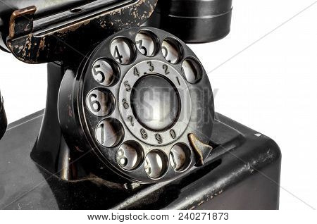 Disk Dialer Of Old Vintage Black Phone Close-up