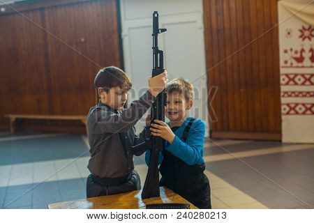 NIKOLSKY, RUSSIA - JAN 19, 2018: Training of children to use weapons in the framework of revival program of the Cossacks in the Leningrad region. Cossacks in St.Petersburg began its revival in 1990.