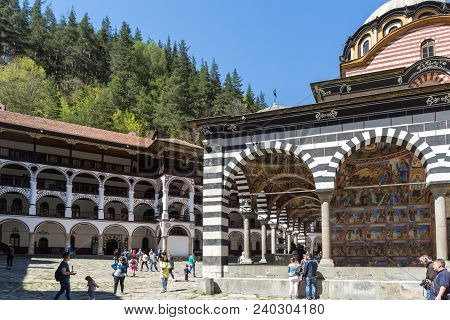 Rila Monastery, Bulgaria - April 21, 2018: Tourists Visiting Monastery Of Saint Ivan (john) Of Rila 