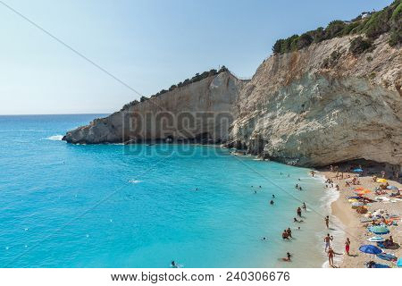 Porto Katsiki Beach, Lefkada, Greece - July 16, 2014: People Visiting Porto Katsiki Beach With Blue 