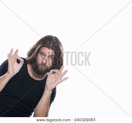 Ok Gesture , Ok Sign. Happy Young Man In Shirt Gesturing Ok Sign And Smiling Isolated On White. Ever
