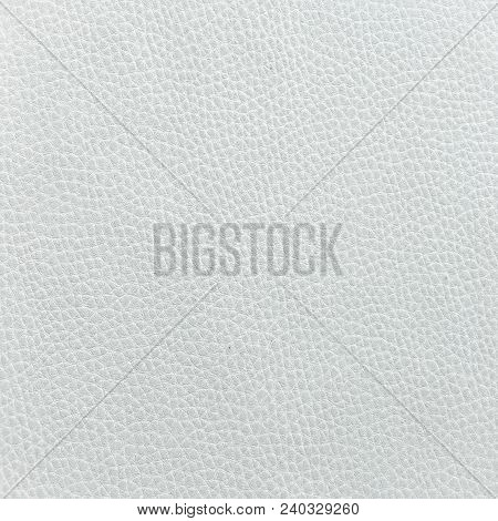Closeup Of Seamless White Leather Texture. Background With Texture Of White Leather. Beige Leather T