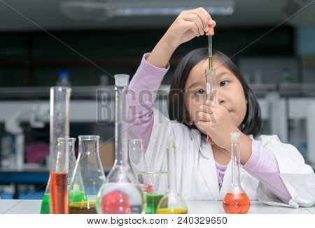 Happy Little Scientist Making Experiment