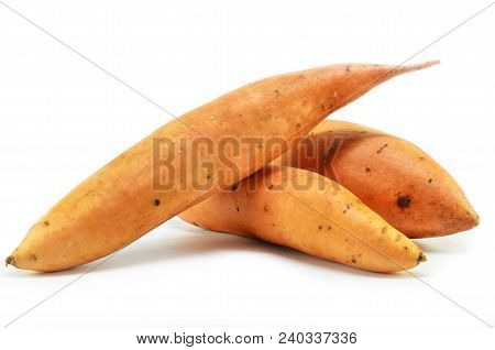 Sweet Potatoes Isolated On A White Background