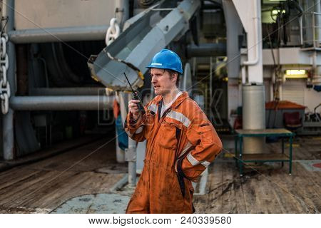 Marine Deck Officer Or Chief Mate On Deck Of Offshore Vessel Or Ship , Wearing Ppe Personal Protecti